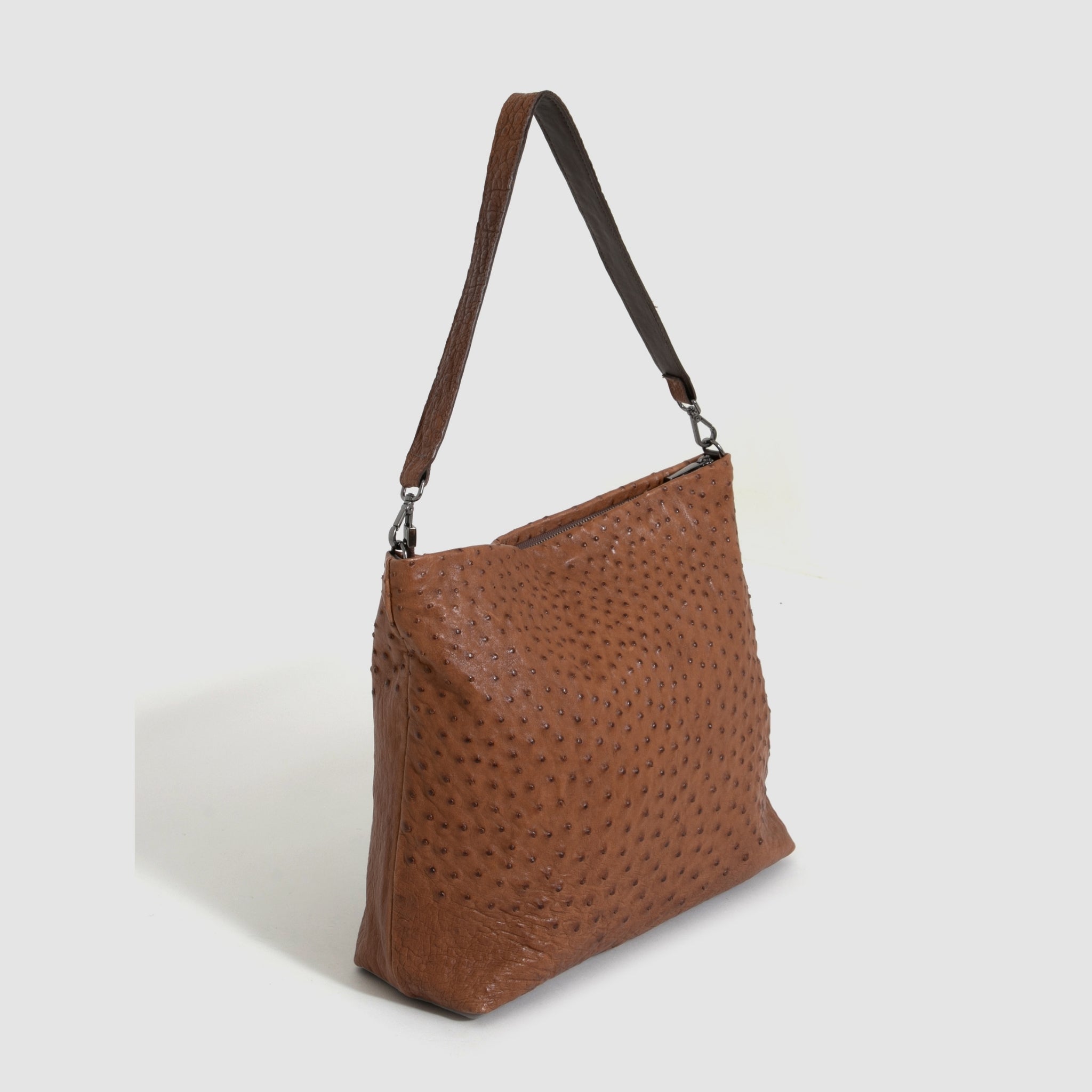 Bolsa Mochila Cumbaru Couro Avestruz
